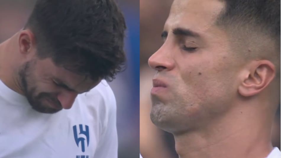 Rubén Neves y Joao Cancelo en el minuto de silencio por Diogo Jota y André Silva