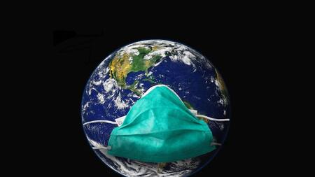 Epidemia en el mundo, mundo con barbijo, imagen ilustrativa.