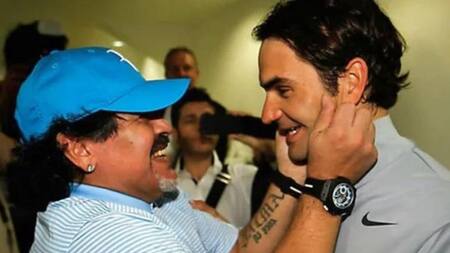 Roger Federer y Diego Maradona. Foto: NA.