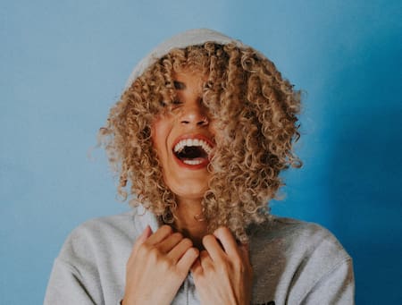 Persona feliz. Foto Unsplash.