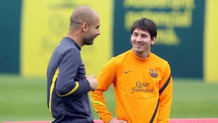 Pep Guardiola y Lionel Mess, foto NA