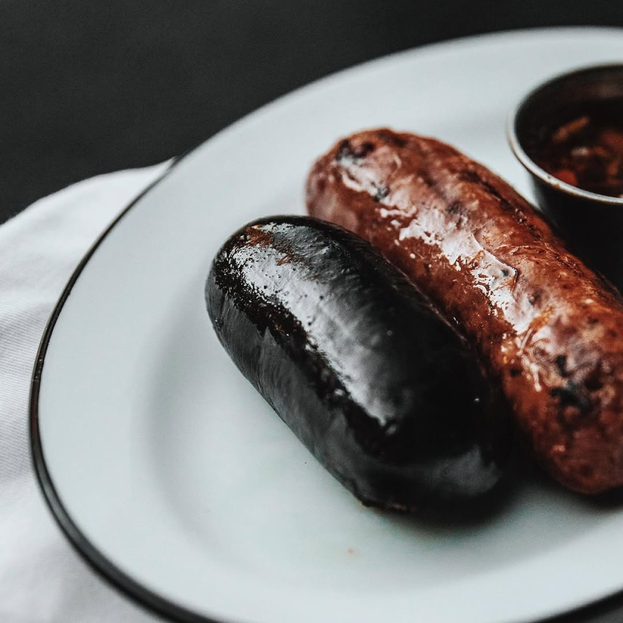 Chorizo y morcilla. Foto: Instagram @happeningba