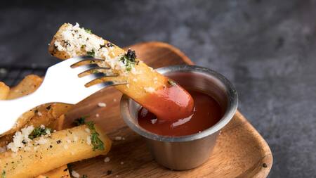 Papas con queso parmesano. Fuente: Pexels