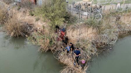 Migrantes en la frontera México-EEUU. Foto: Reuters