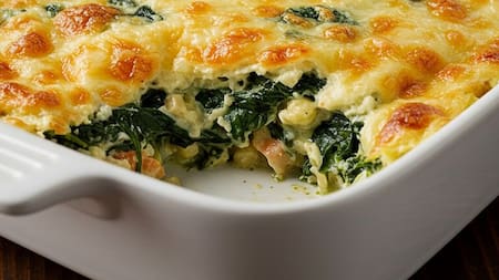 Espinaca con queso grillado