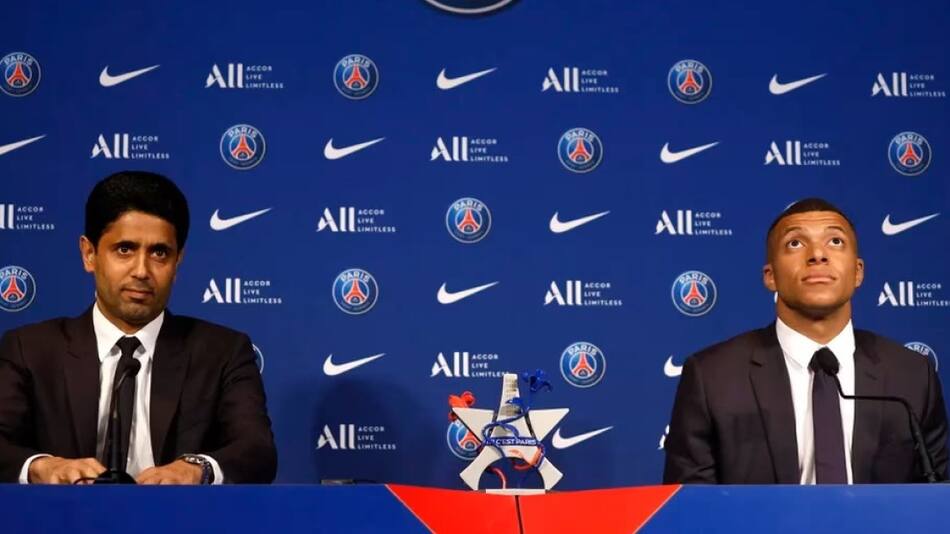 Kylian Mbappé y el presidente del PSG,  Nasser Al-Khelaïfi. Foto: Reuters.