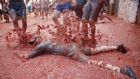 Tomatina en Buñol, el evento que aglutina a miles de personas. Foto: EFE.