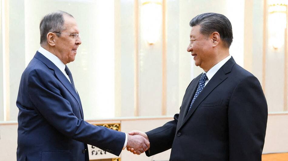 Reunión de Xi Jinping y Serguéi Lavrov. Foto: Reuters.