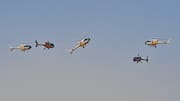 Helicópteros acróbatas de la Patrulla Aspa del Ejército Español