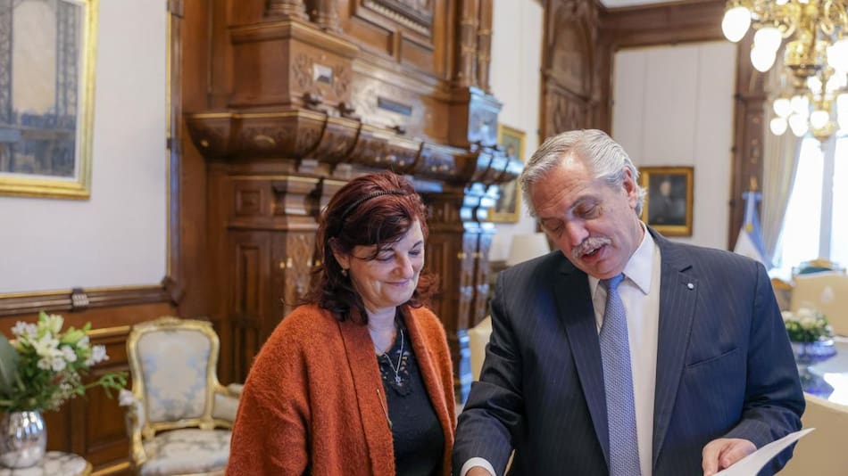 Kelly Olmos y Alberto Fernández. Foto: NA.