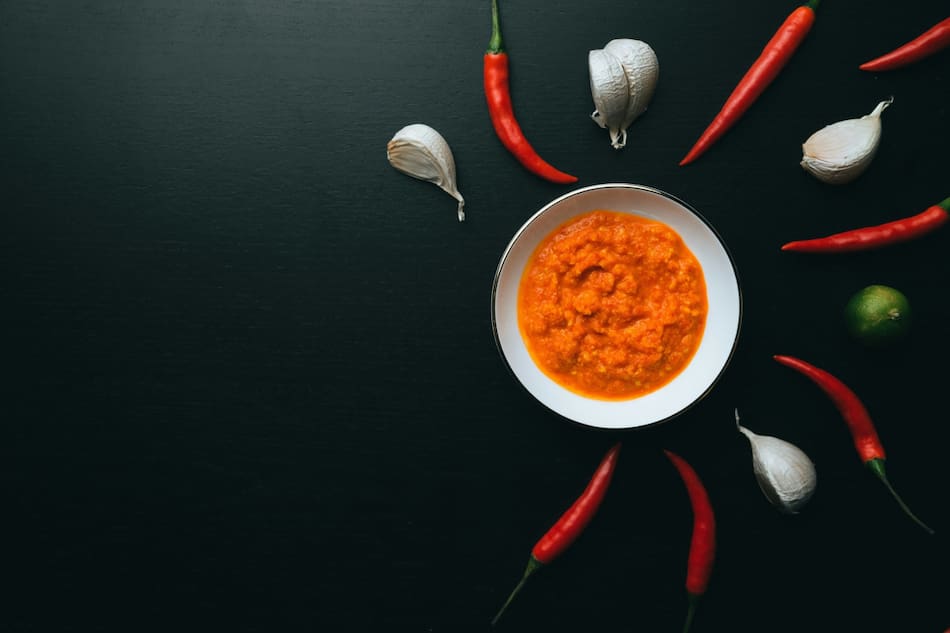 Risotto sofrito ajo cebolla morrón comida. Foto Unsplash