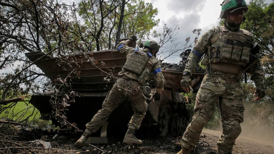 Miembros del servicio ucraniano en la región de Donetsk, Ucrania. Foto: Reuters.
