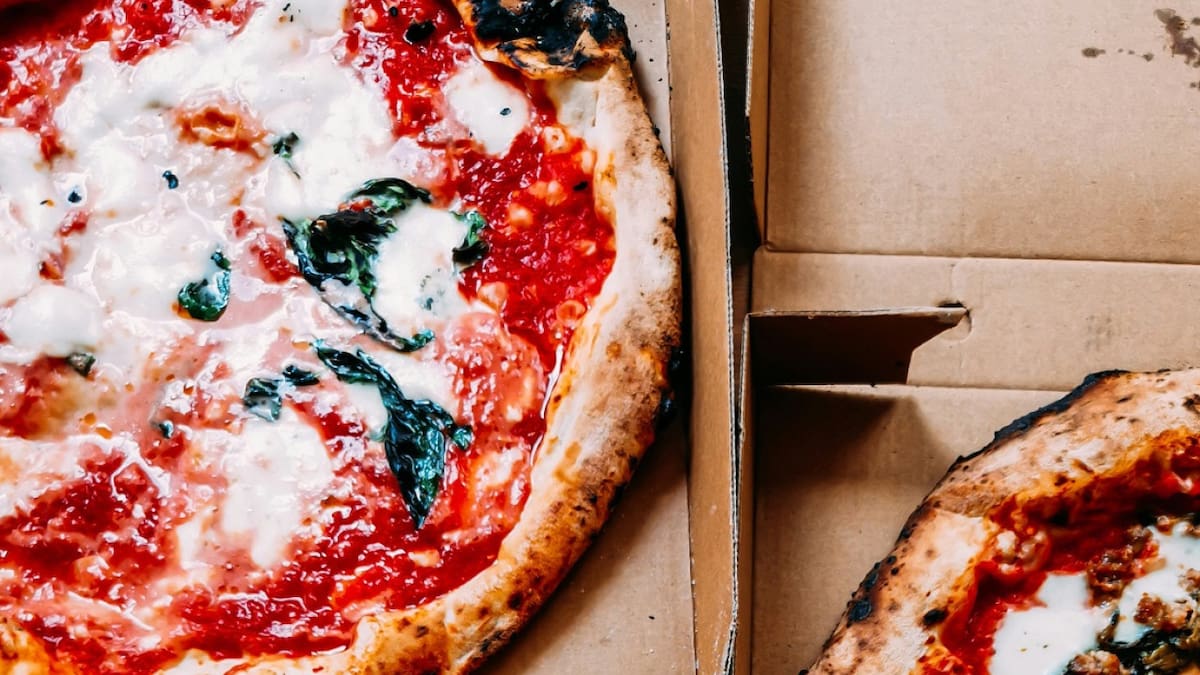 Pizza; pizzería; comida. Foto: Unsplash.