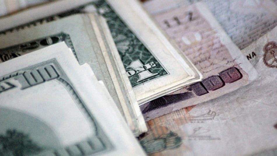 Dólares y pesos - Blanqueo de capitales