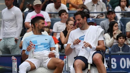 Novak Djokovic y Juan Martín Del Potro en el US Open. Foto. NA.