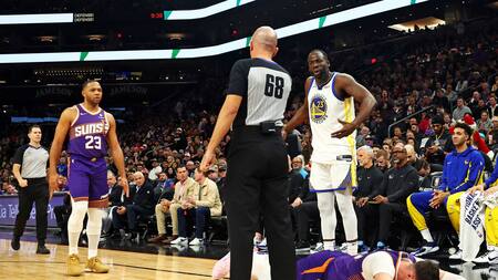 El brutal manotazo de Draymond Green. Foto: Reuters