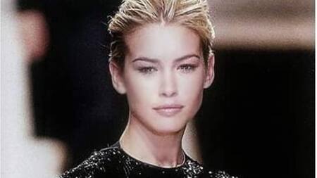 Valeria Mazza junto a Giorgio Armani.