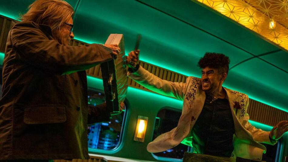 Bad Bunny y Brad Pitt. Foto EFE.