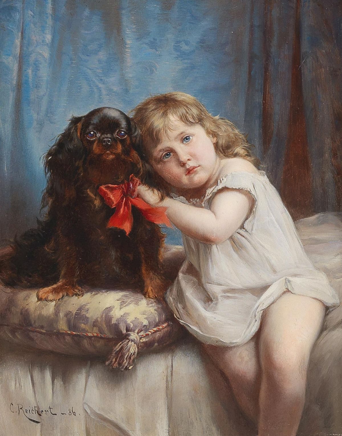 Cavalier King Charles Spaniel con una niña