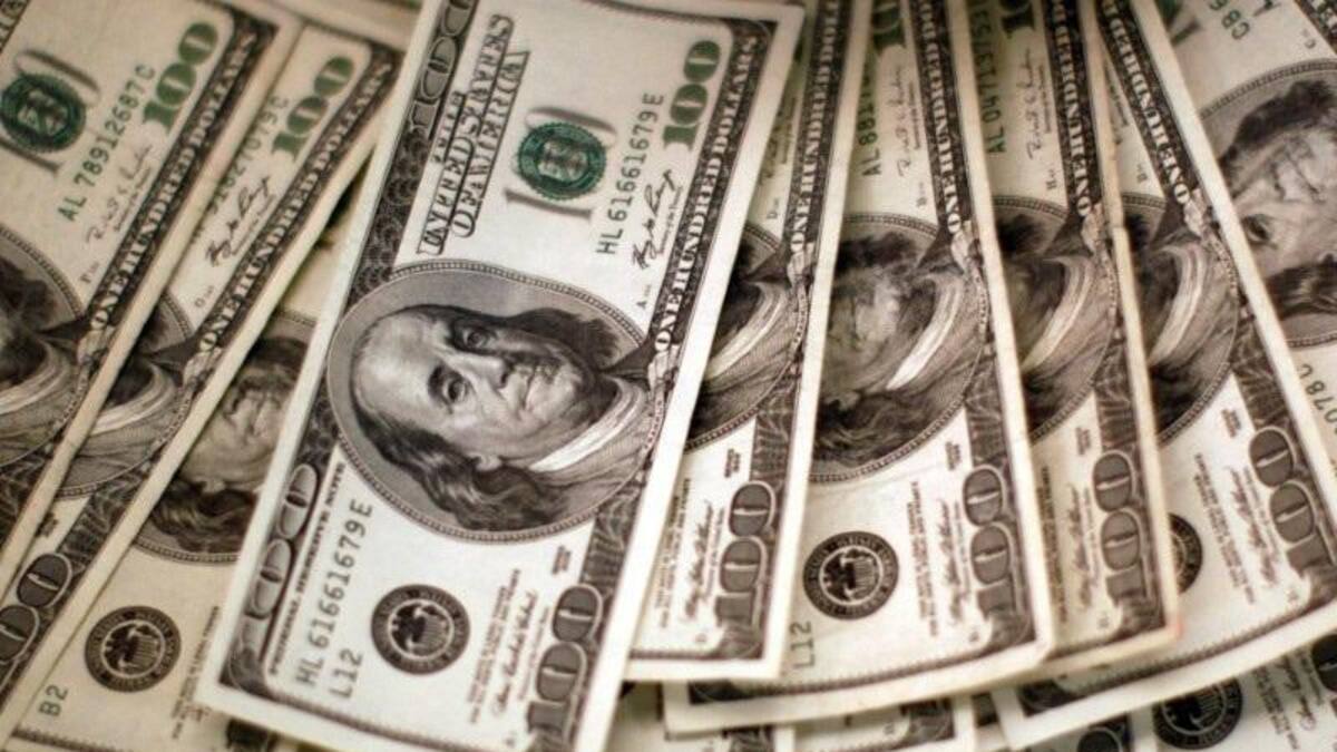 Dólares, billetes de dólar, Reuters