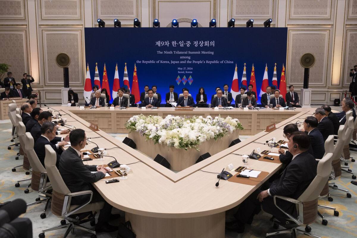 Reunión trilateral entre Japón, Corea del Sur y China. Foto: EFE
