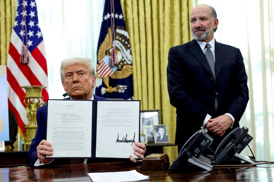 Donald Trump junto al secretario de Comercio, Howard Lutnick. Foto: Reuters.