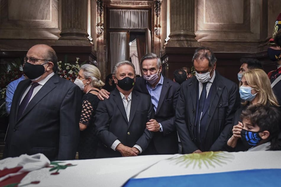 Duhalde, Pichetto y Scioli en el velatorio de Carlos Menem, NA