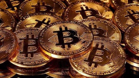 Bitcoin, criptomoneda, economía, Reuters.