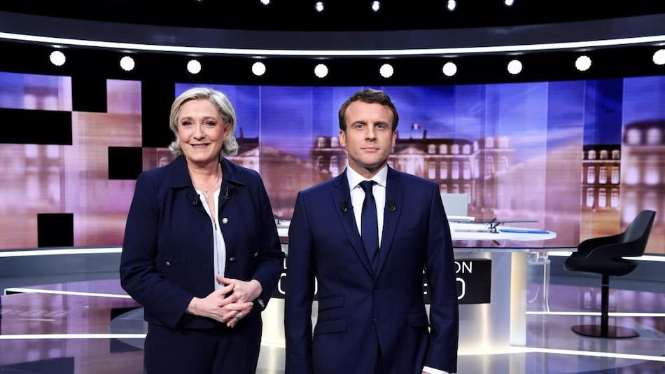 Macron y Le Pen, AFP
