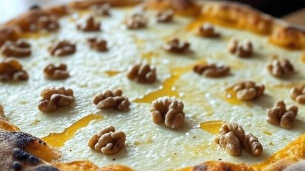 Comer más sano, pero igual de sabroso: cómo preparar pizza de calabaza y ricota con nueces tostadas