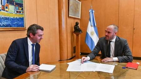 Guillermo Hang y Martín Guzmán. Foto: NA.