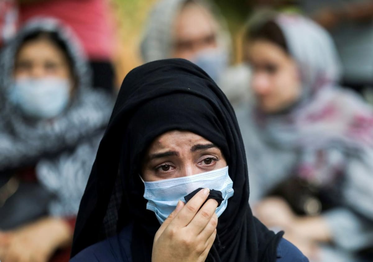 Mujer afgana en Centro de refugiados, Reuters