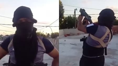 Encapuchado, con chaleco policial y armas: el video del “Negro Juan”, señalado por proveer armas en el ataque en Córdoba que dejó a una joven parapléjica