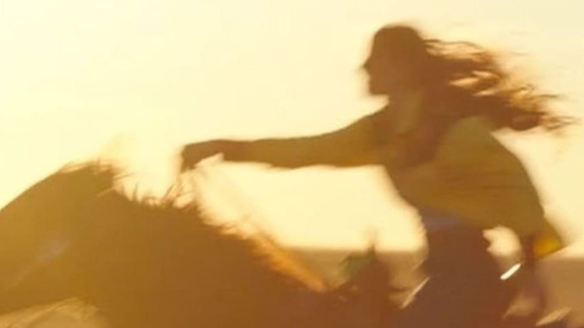 Constanza, horse whisperer.