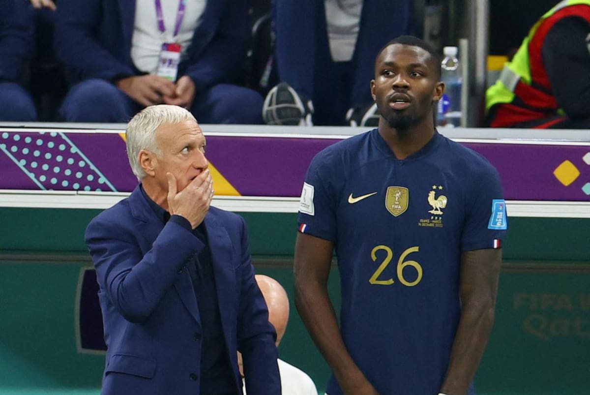 Didier Deschamps y Marcus Thuram. Foto: Reuters.