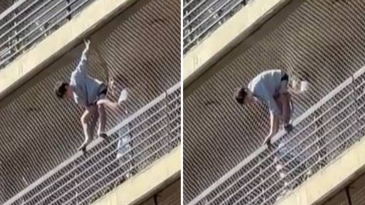 El desesperado rescate de un niño que quedó colgado del balcón de un décimo piso. Foto: captura de video.