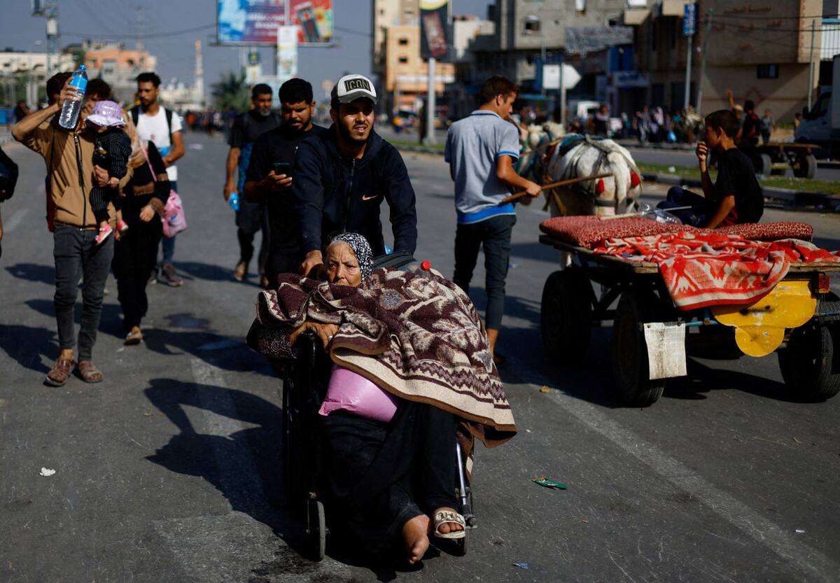 Evacuación de palestinos de Gaza tras los ataques de Israel. Foto: REUTERS.