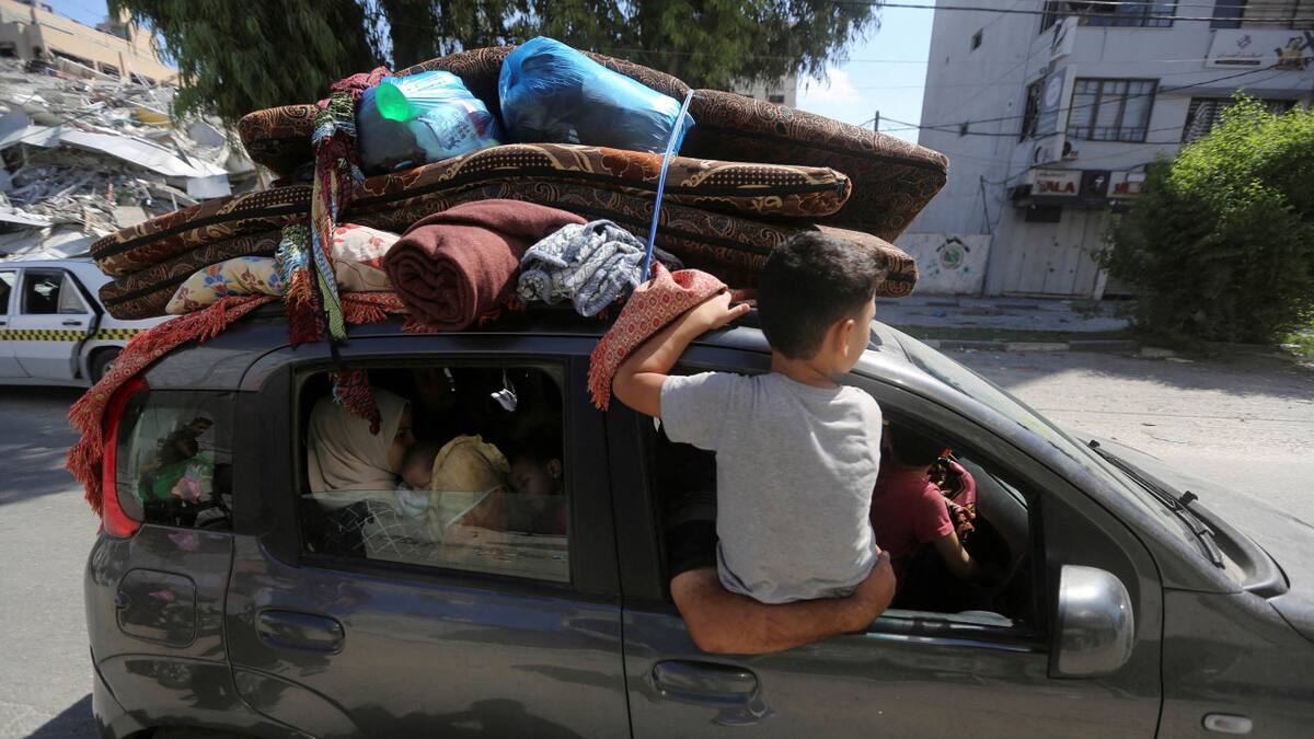 Éxodo de civiles de la Franja de Gaza. Foto: NA.
