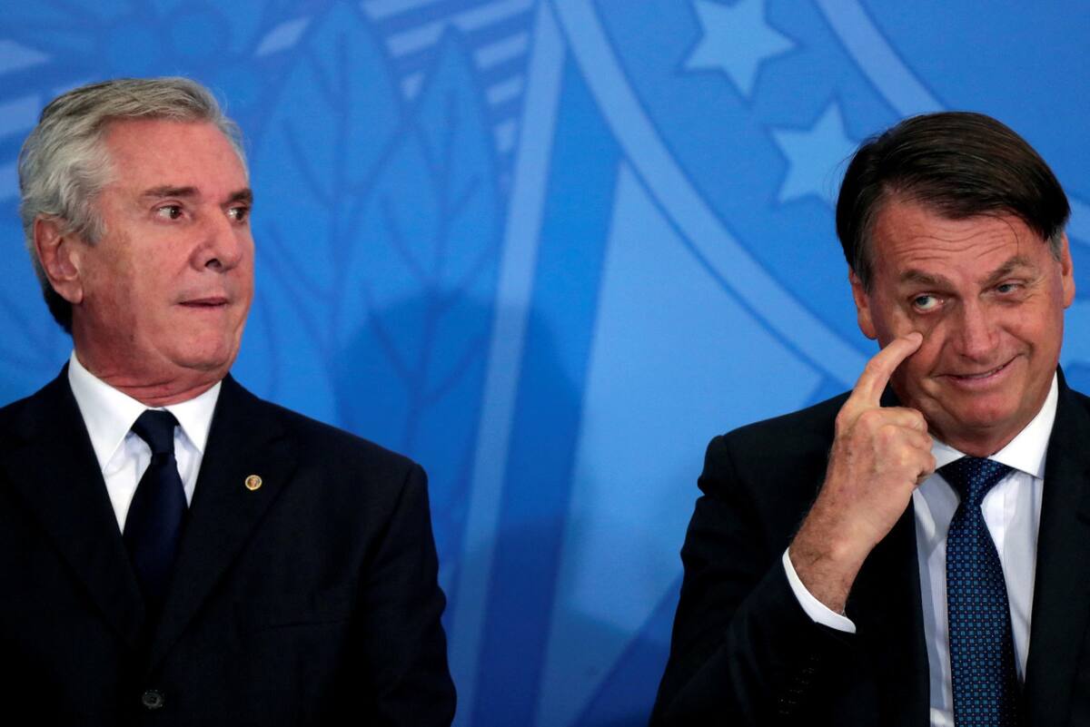 Fernando Collor de Mello junto a Jair Bolsonaro. Foto: REUTERS/Ueslei Marcelino.