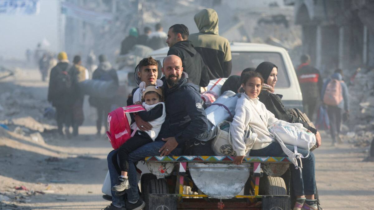 Palestinos regresan a la Franja de Gaza. Foto: Reuters/Dawoud Abu Alkas.