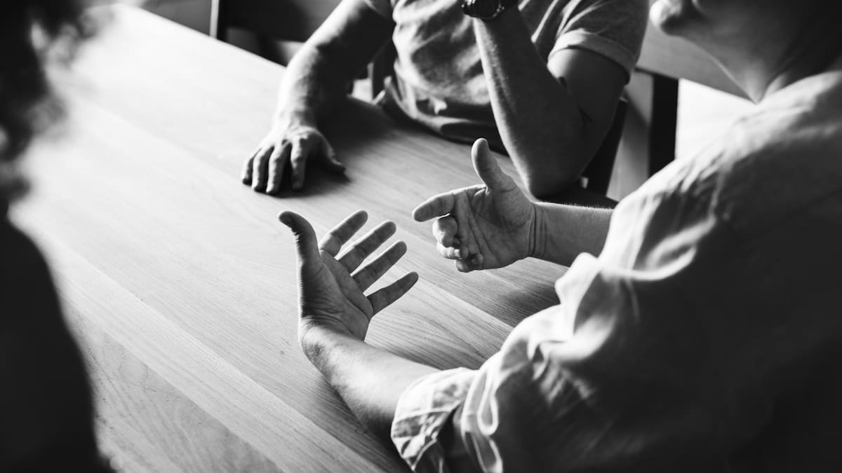 Indemnización, reunión. Foto: Freepik