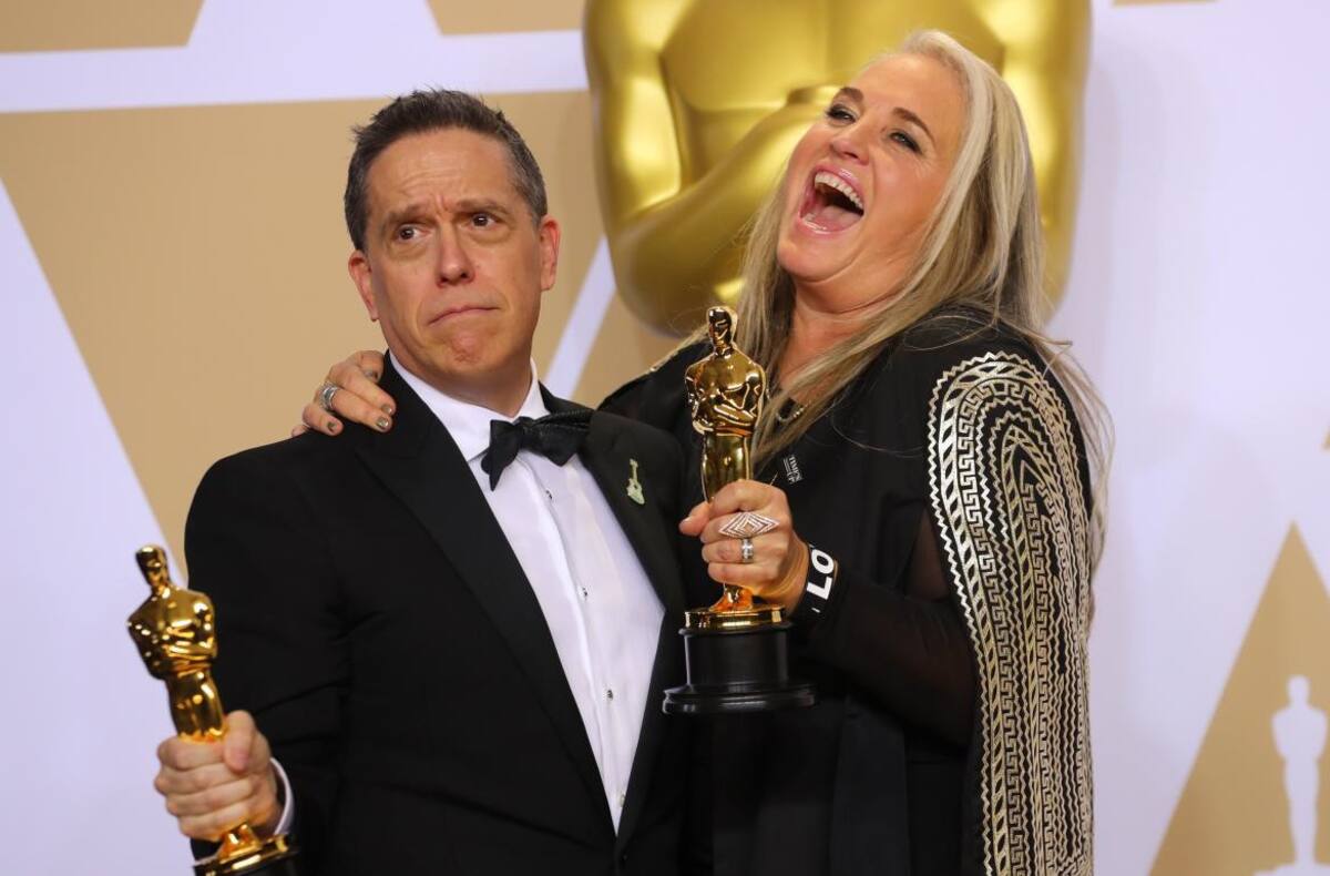 Lee Unkrich (L) y Darla K Anderson, directores de Coco, Oscar 2018
