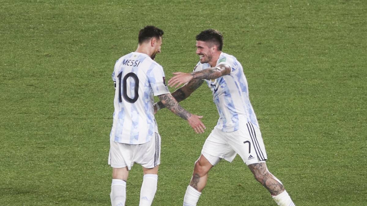 Lionel Messi y Rodrigo De Paul. Foto: NA.