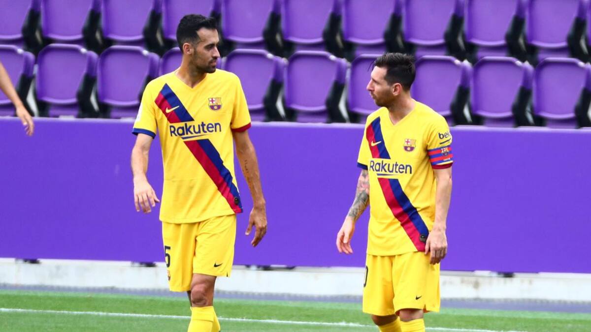 Lionel Messi y Sergio Busquets en el Barcelona. Foto: REUTERS.