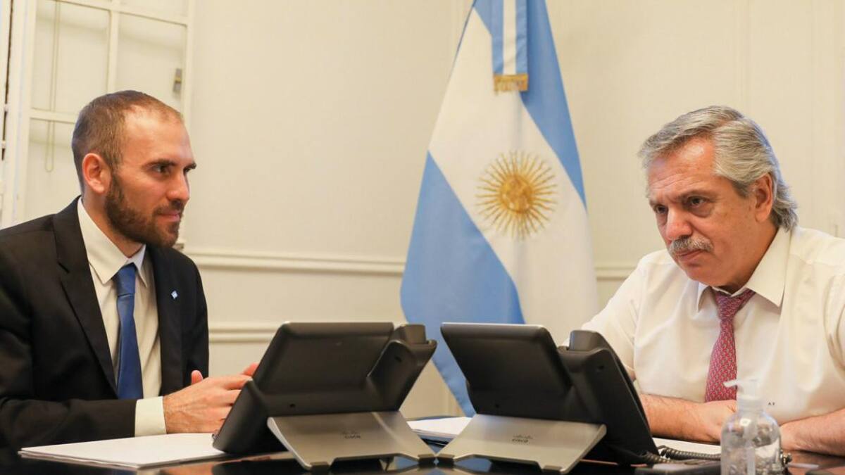 Martín Guzmán y Alberto Fernández. NA.