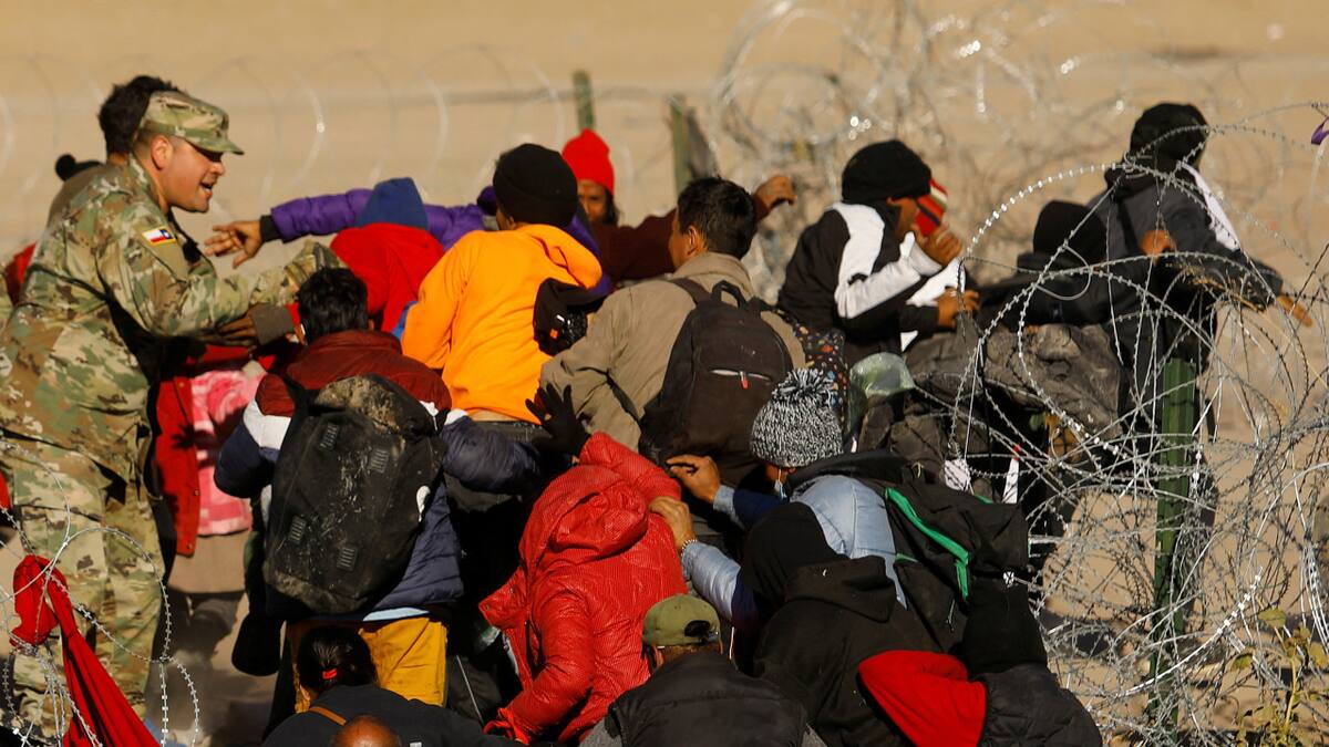 Migrantes en la frontera entre México y Estados Unidos. Foto: Reuters.