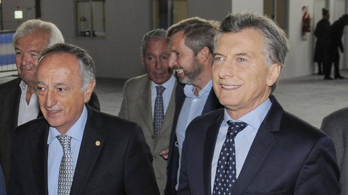 Miguel Acevedo y Mauricio Macri (NA)