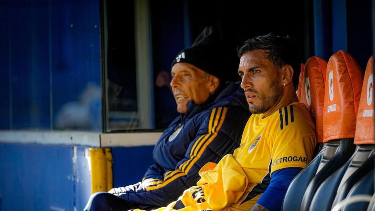 Miguel Ángel Russo con Leandro Paredes.