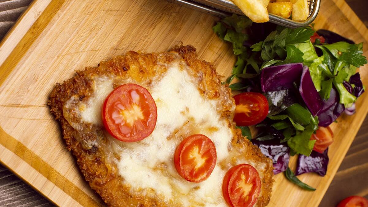 Milanesa; comida. Foto: Freepik.
