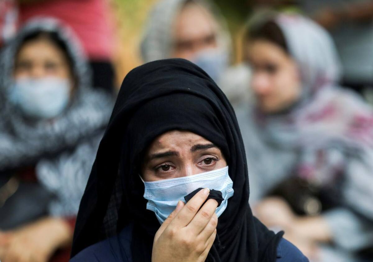 Mujer afgana en Centro de refugiados, Reuters